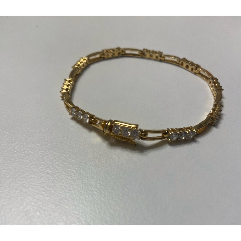 Boutique Gold Trim Tennis Bracelet with Encrusted Gems